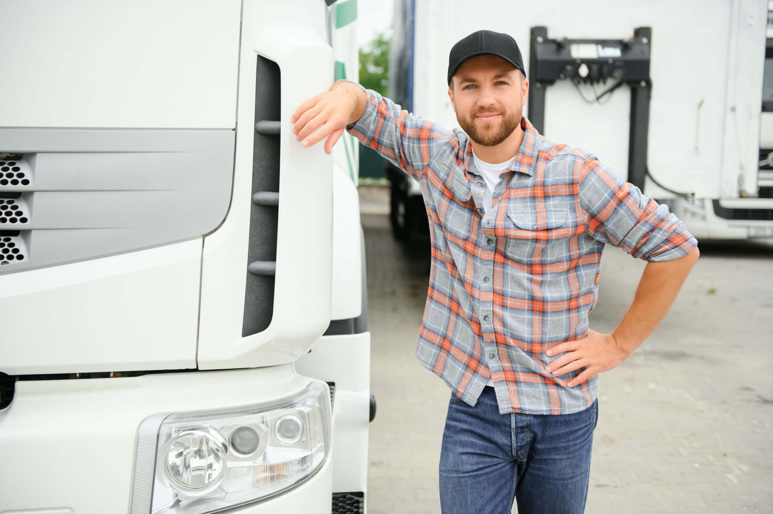 portrait of young caucasian bearded trucker standi ushelbu
